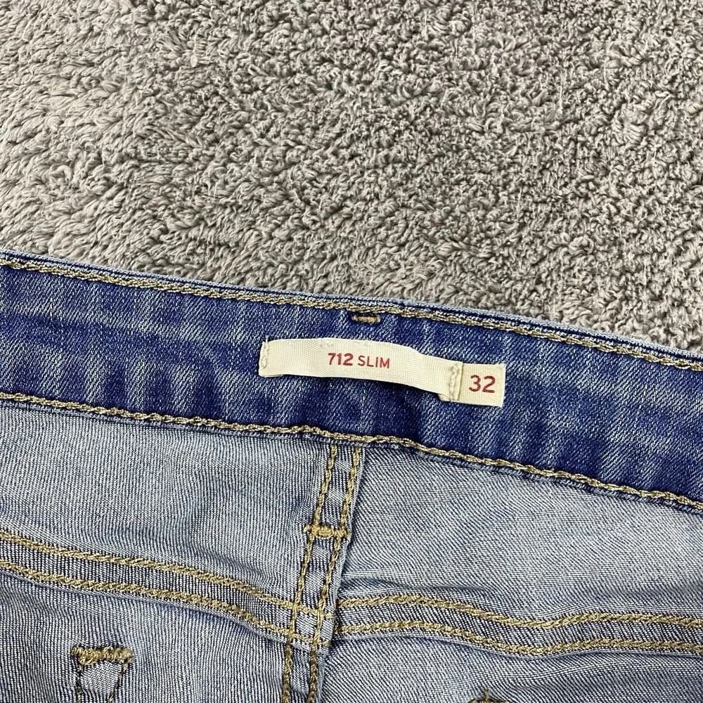 Levis 712 Slim Jeans Womens 32 Blue Medium‎ Wash Mid Rise Distressed